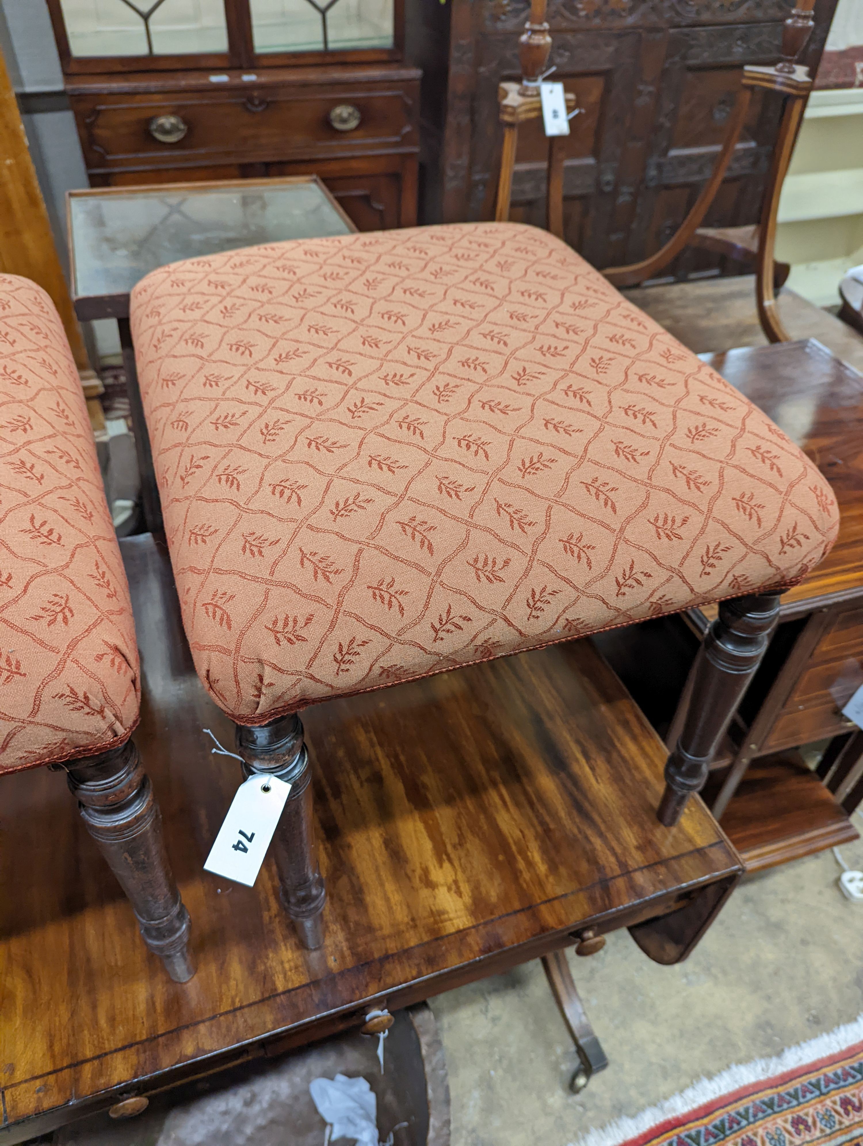 A pair of Regency rectanuglar mahogany upholstered dressing stools, length 50cm, depth 42cm, height 44cm